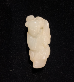 Nephrite jade toggle boy with ling zhi fungus
