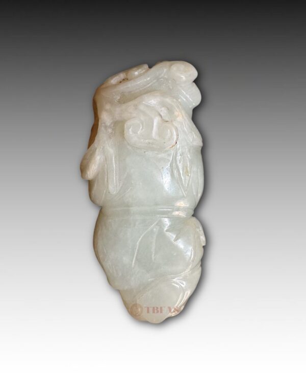 Nephrite jade toggle boy with ling zhi fungus