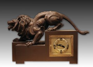 Bronze Lion Clock with "Mauthe clock company" stamp inside