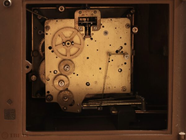 Bronze Lion Clock with "Mauthe clock company" stamp inside