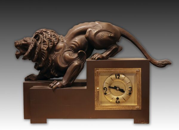 Bronze Lion Clock with "Mauthe clock company" stamp inside