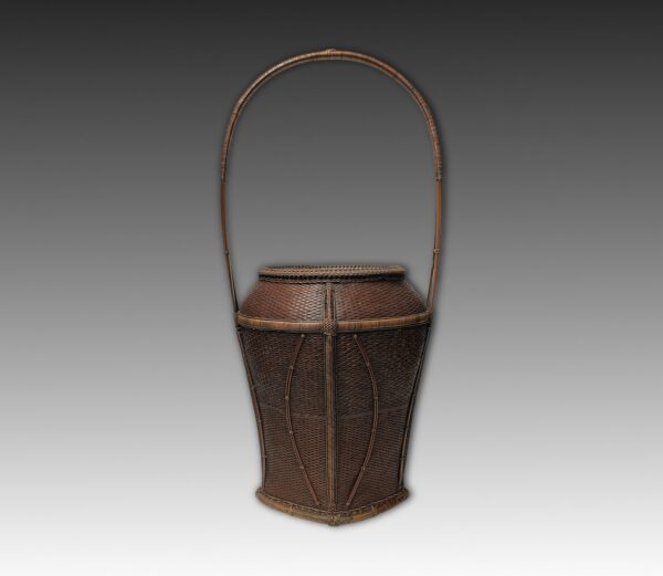 Waisted vase form hoop handle basket